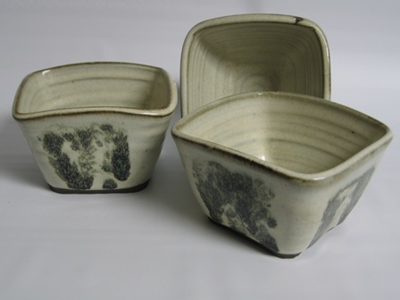 Three square bowls